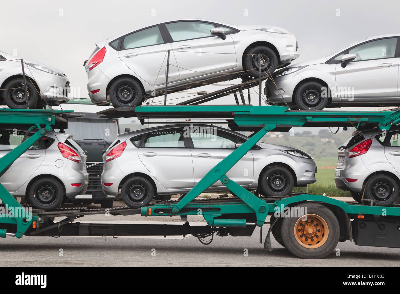 New cars on back of transporter, Granada, Spain Stock Photo Alamy