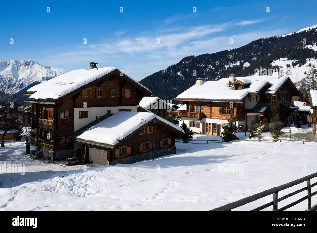 Typical large chalets in the centre of the resort of Verbier, Valais, Switzerland Stock Photo