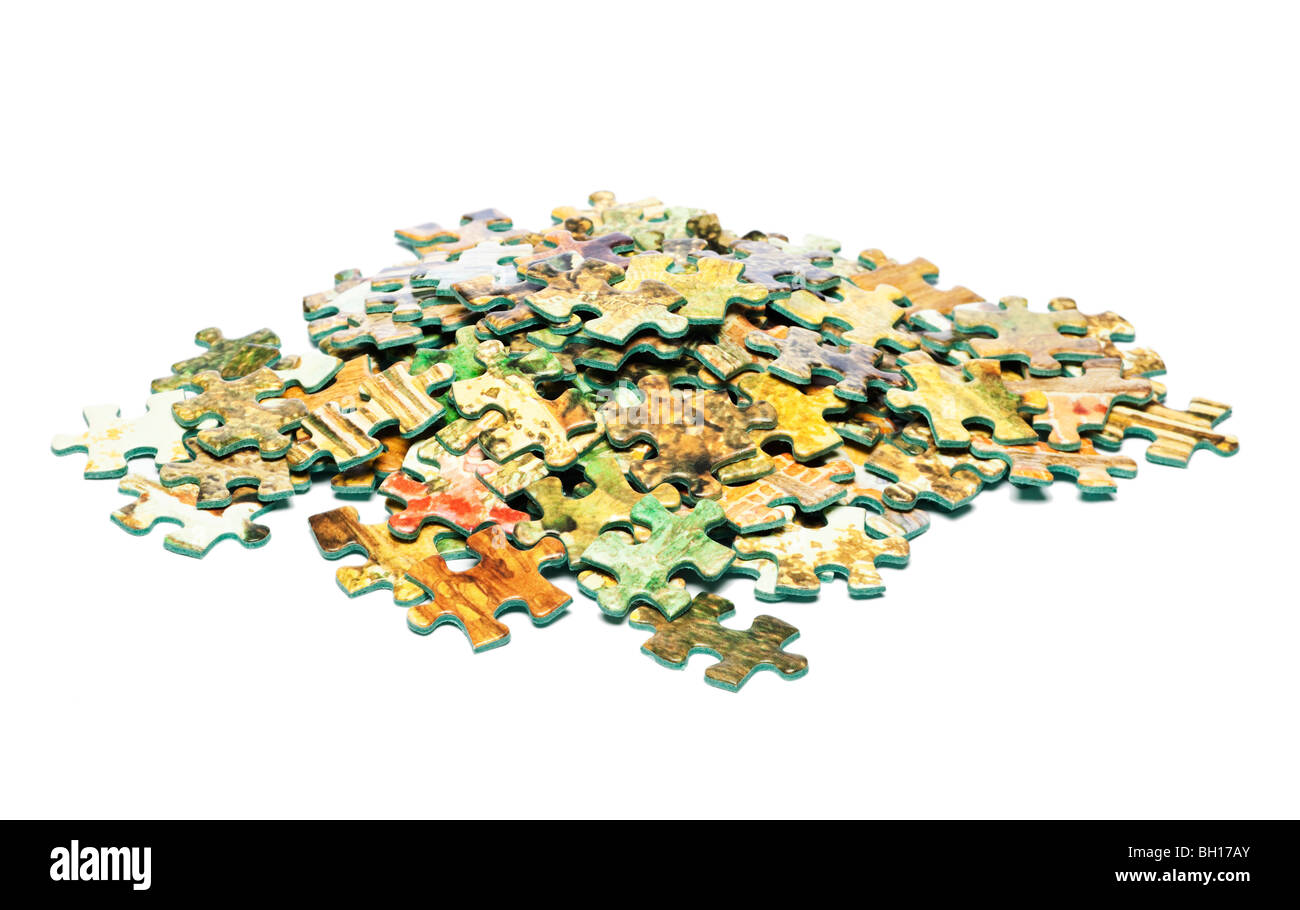 Pile of jigsaw puzzle pieces Stock Photo - Alamy