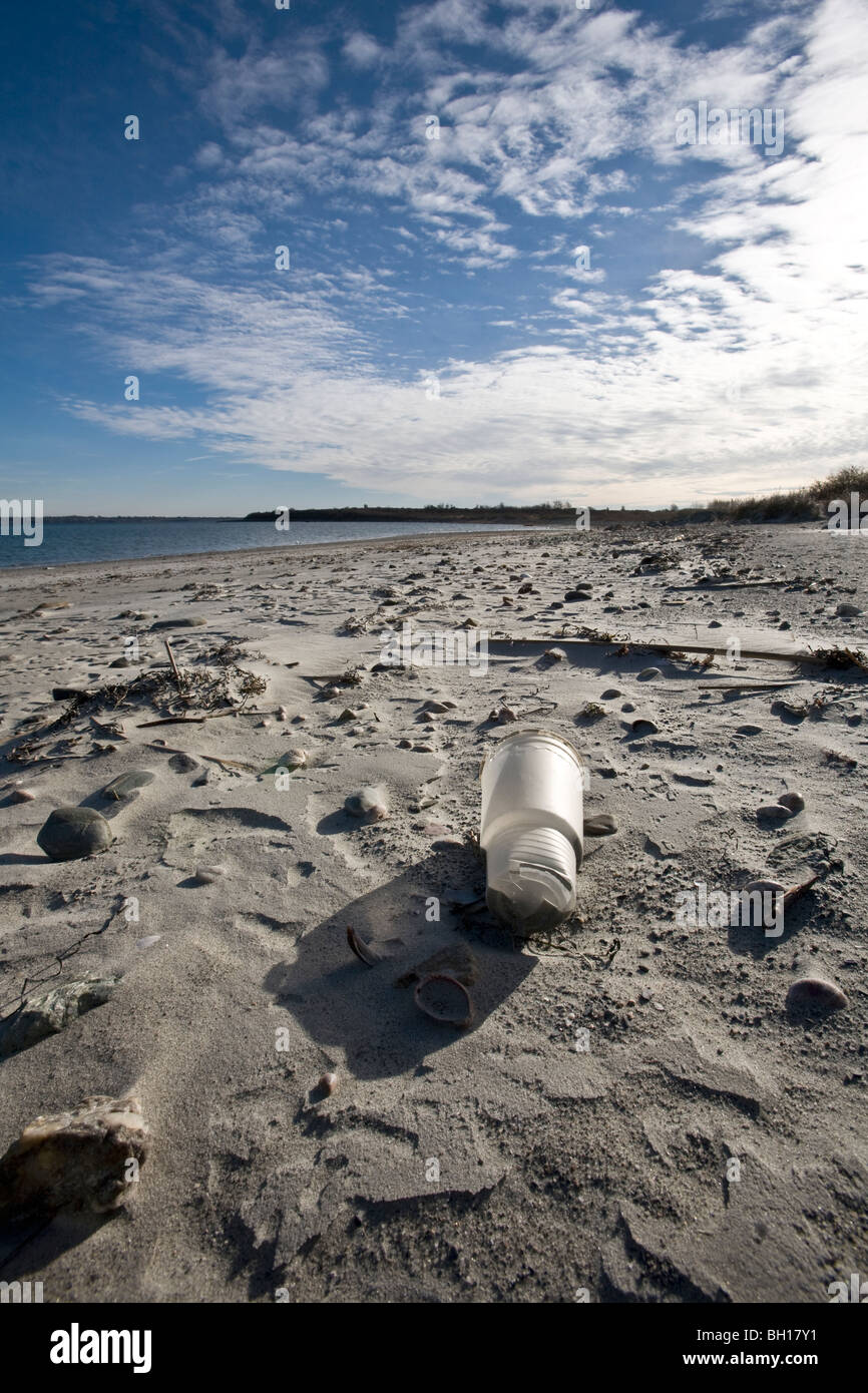 Litter on a beach Stock Photo - Alamy
