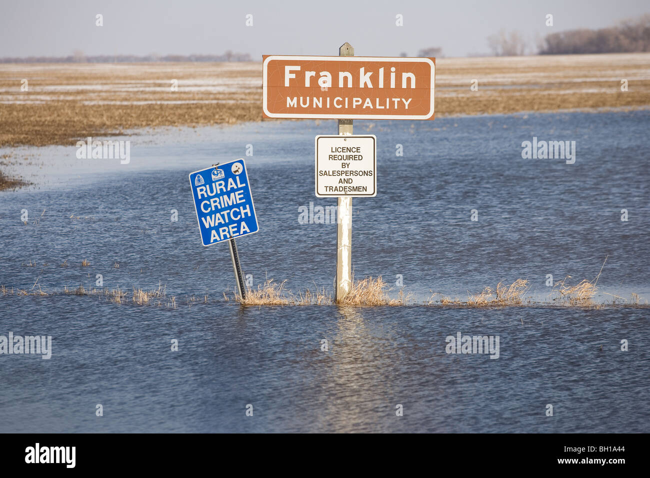 Floodwaters from Red River make field look like a lake, Franklin, Manitoba, Canada Stock Photo