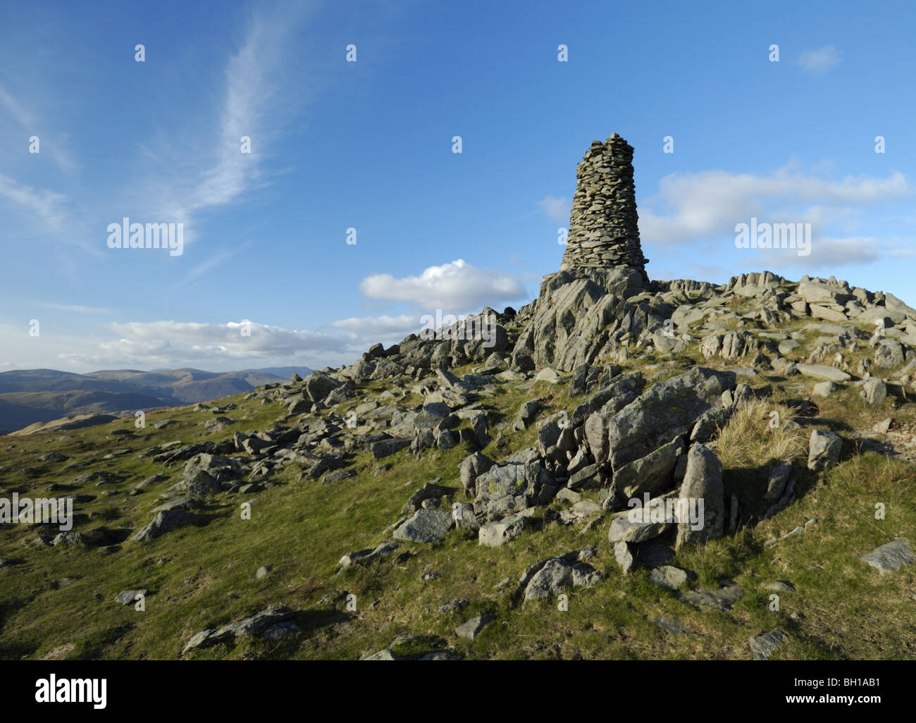 Cumbrian hill, summit of  'High Street' in the English lakes region with blue sky and lower hills in the distance Stock Photo