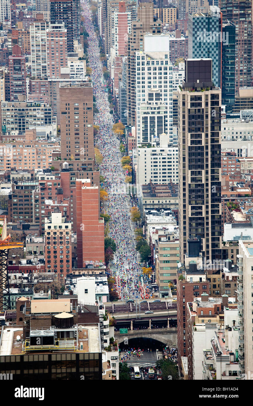 View up First Avenue as New York City Marathon runners have entered Manhattan. Stock Photo