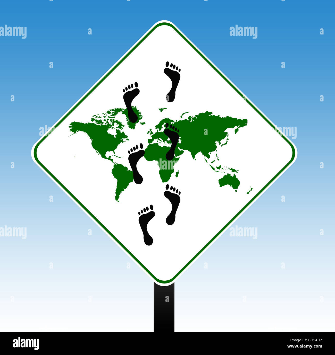 Carbon footprint on world sign with blue sky background. Stock Photo