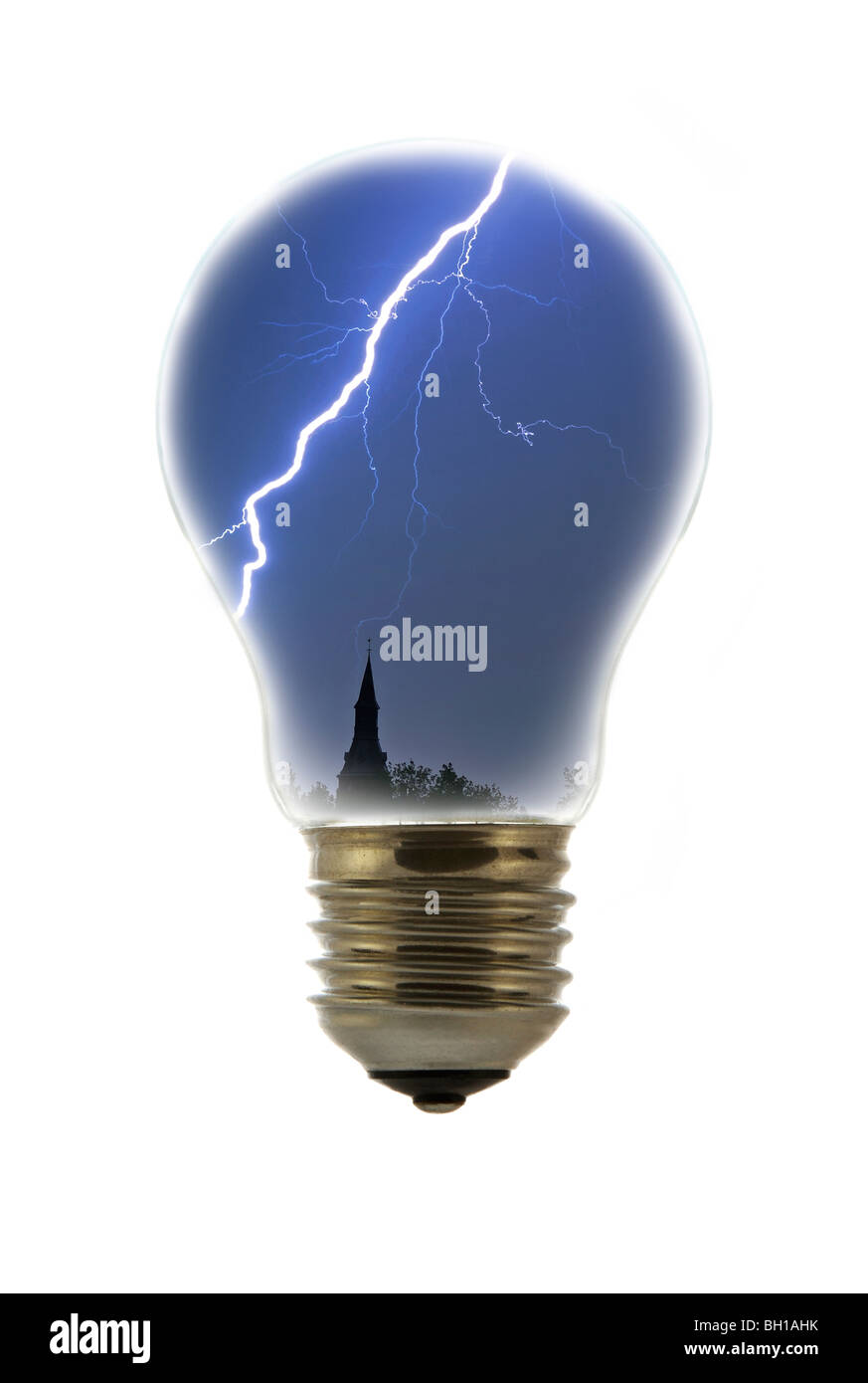 Lightning during thunderstorm above tower inside incandescent lamp / bulb against white background Stock Photo