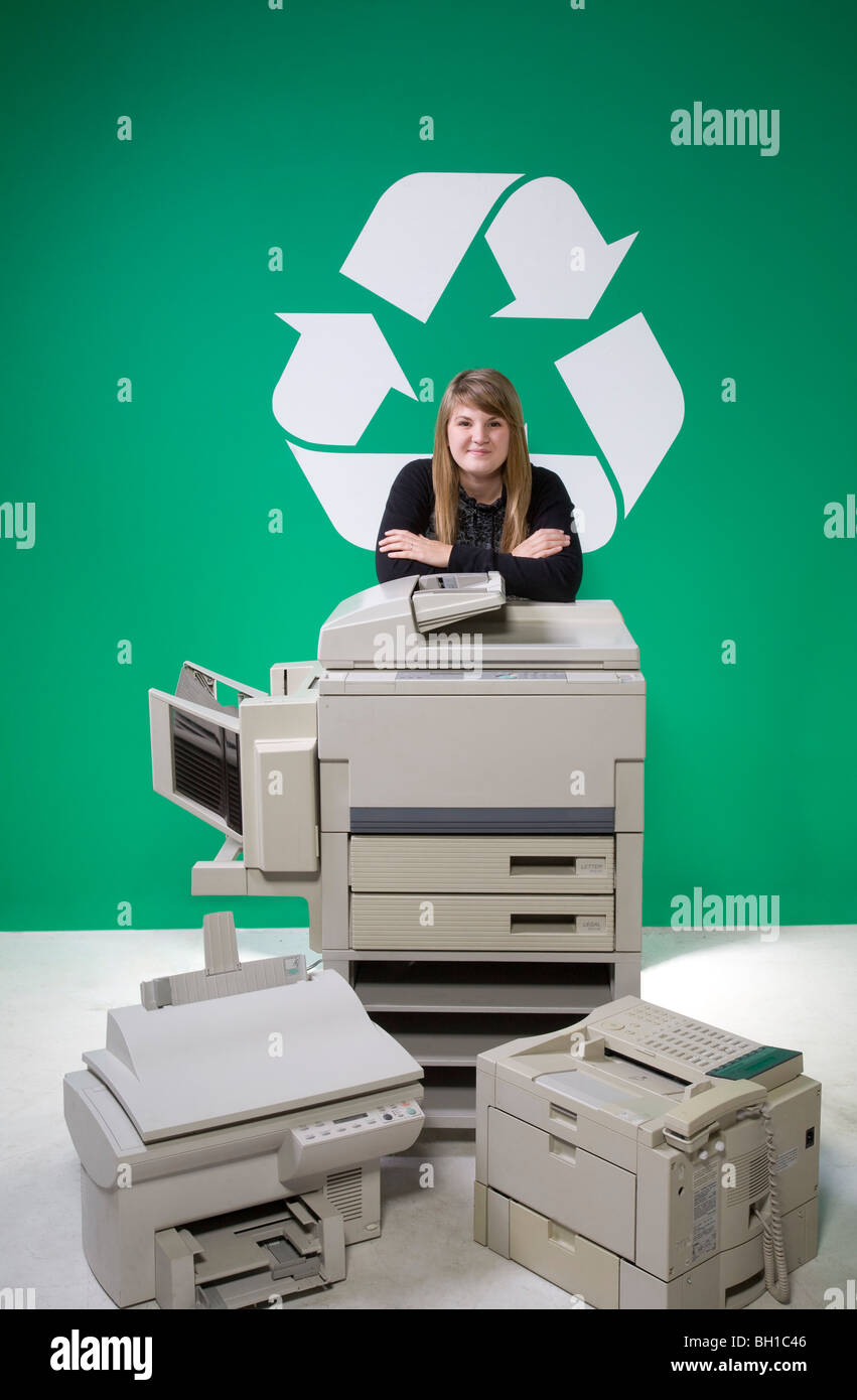 Woman recycling copiers Stock Photo Alamy