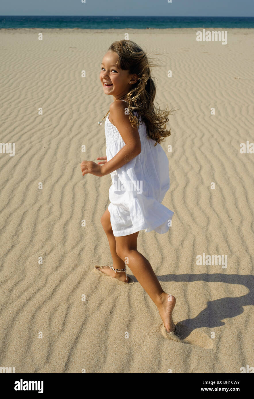 Eye contact back of the dress over the shoulder hires stock