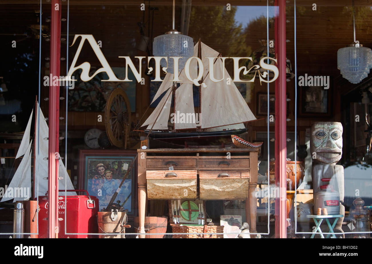 Window of antique store on Washington Street in Victorian seaport of