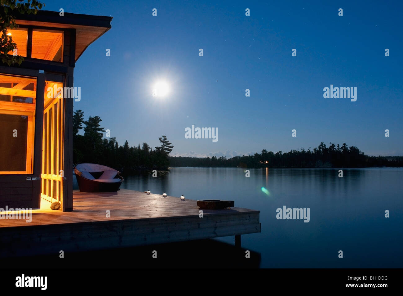 Cabin By The Lake At Night