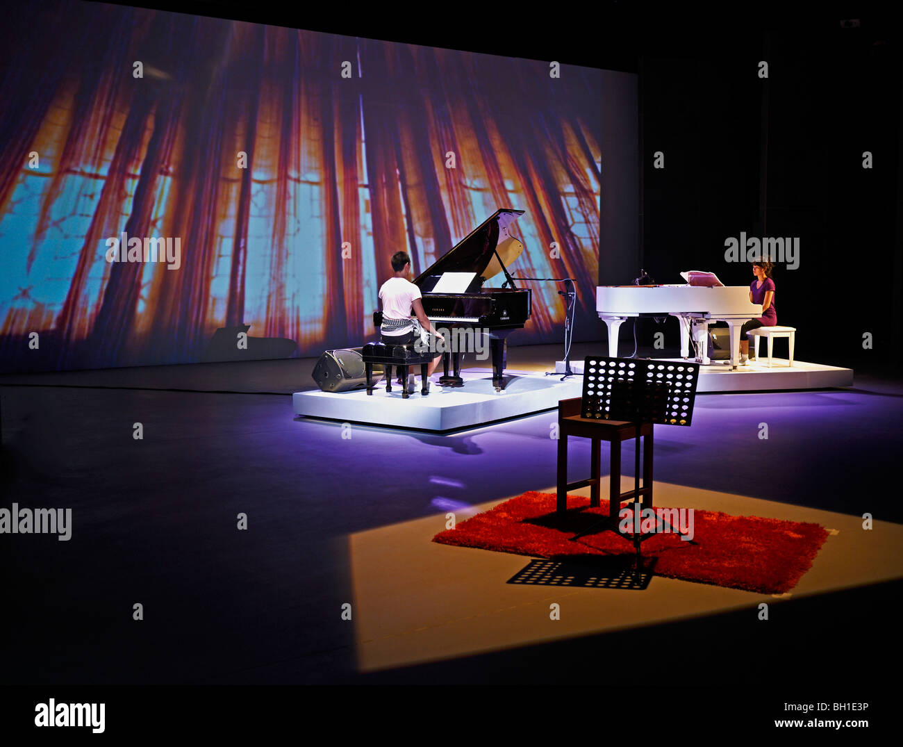 Concert pianists on stage at a Thai venue. Thailand S. E. Asia Stock Photo