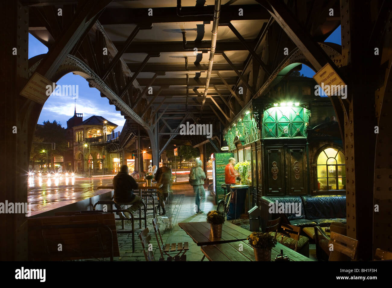 Illuminated snack under the subway station Schlesisches Tor in the ...