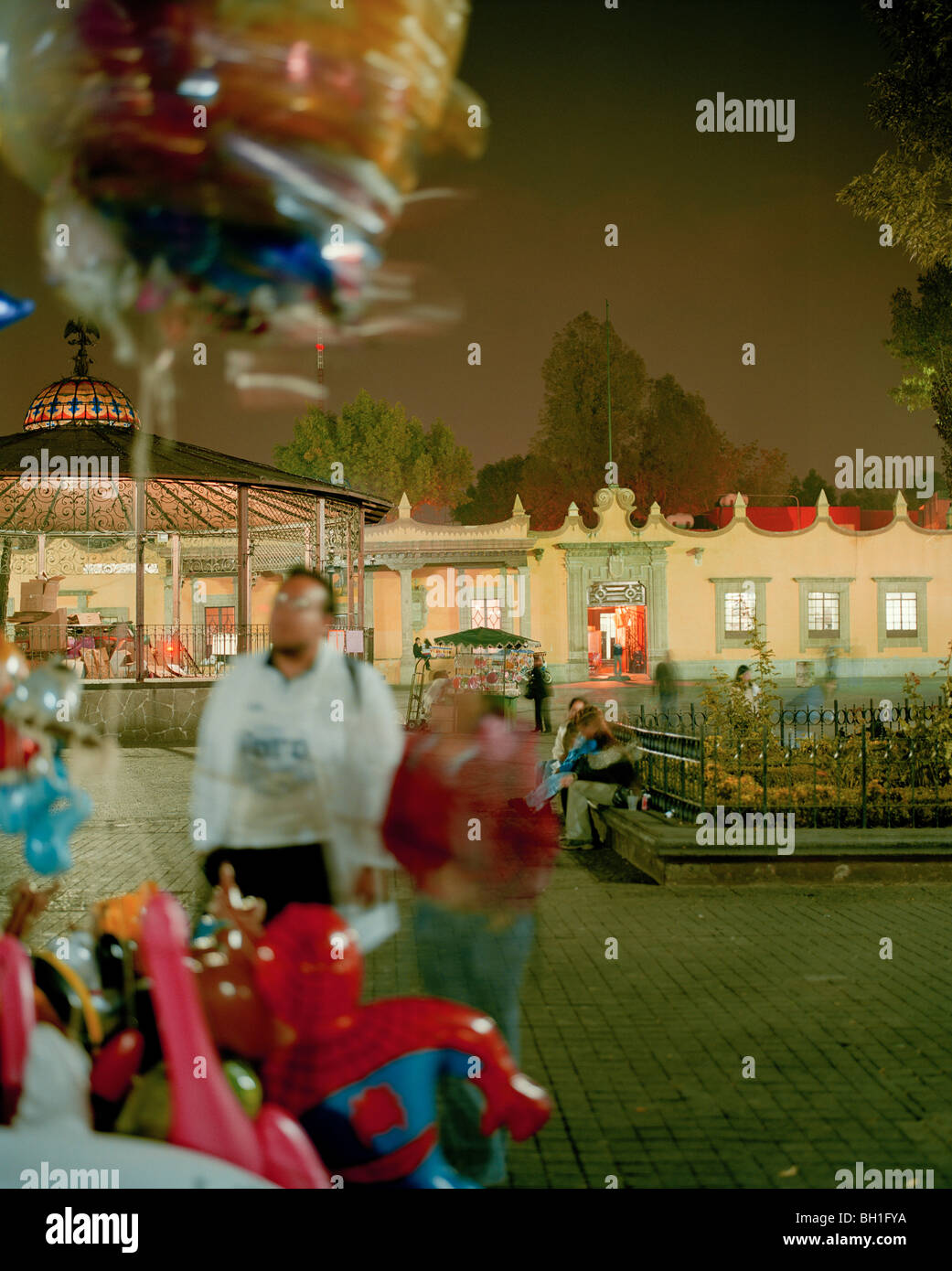 Balloon vendor in front of Casa Municipal in the evening, Square Jardin Hidalgo, Centro Historico at Coyoacan, Mexico City, Mexi Stock Photo