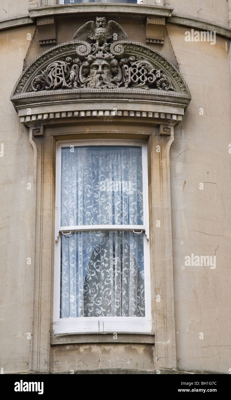 An ornate stone carved window frame Bath, Somerset, England, UK Stock