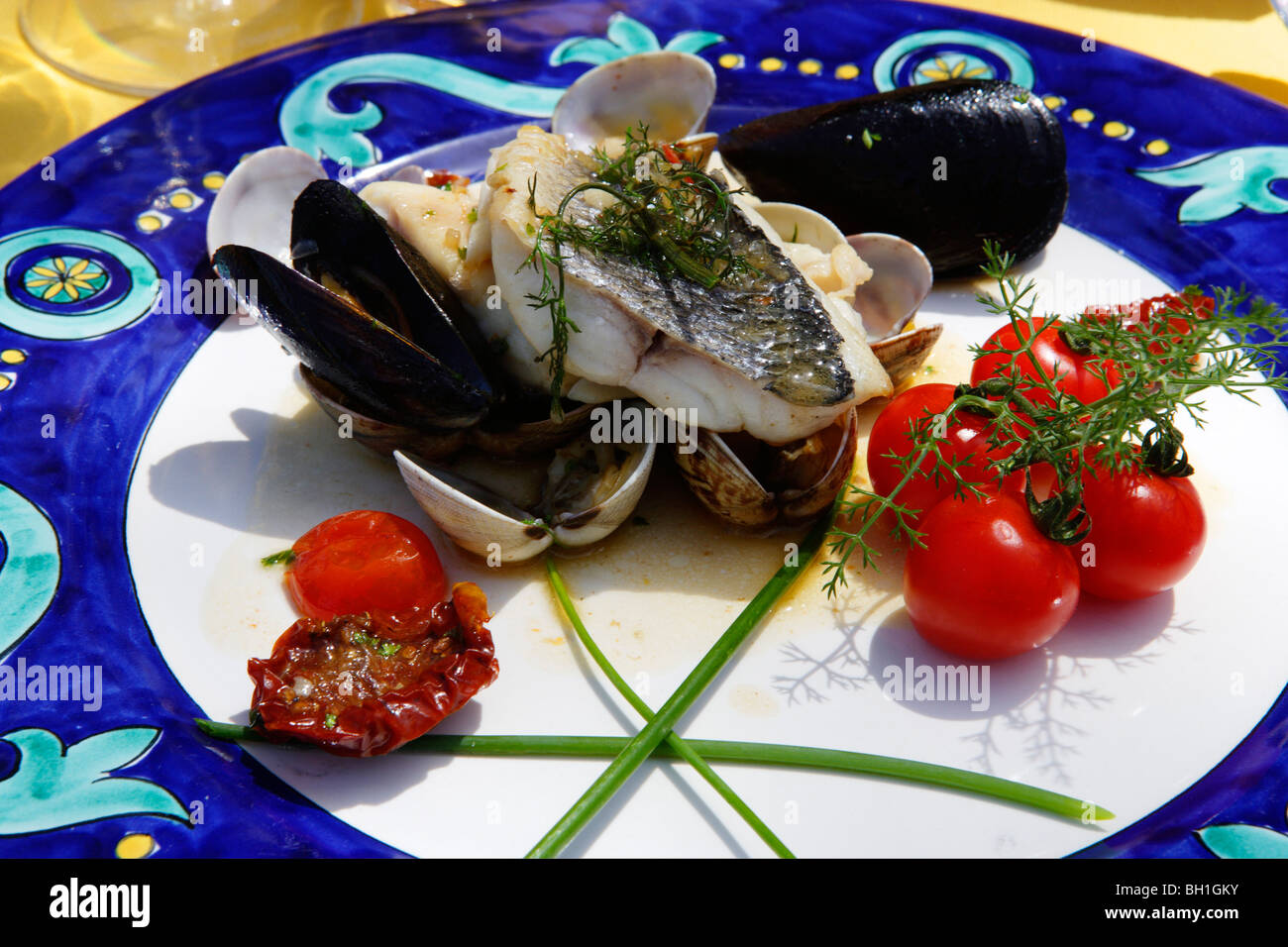 Fish dish on a plate, Capri, Italy, Europe Stock Photo - Alamy