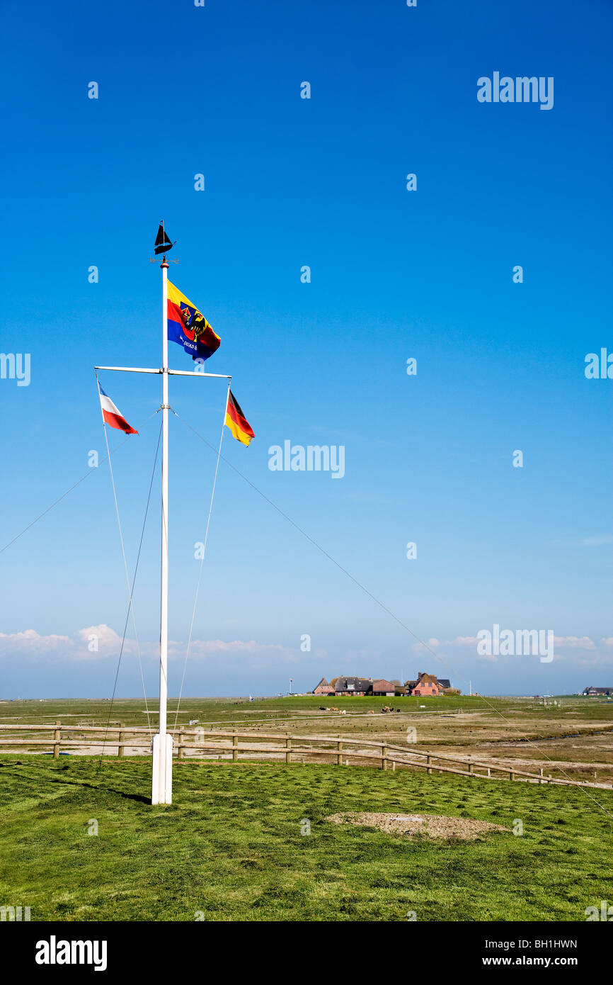 Flagpole at Hooge hallig, North Frisian Islands, Schleswig-Holstein, Germany Stock Photo