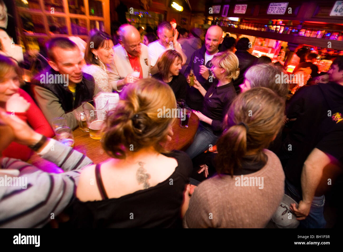 A lot of people in the Apres Ski bar Le Pub, Zinal. Wallis, Valais, Switzerland, Alps. Stock Photo