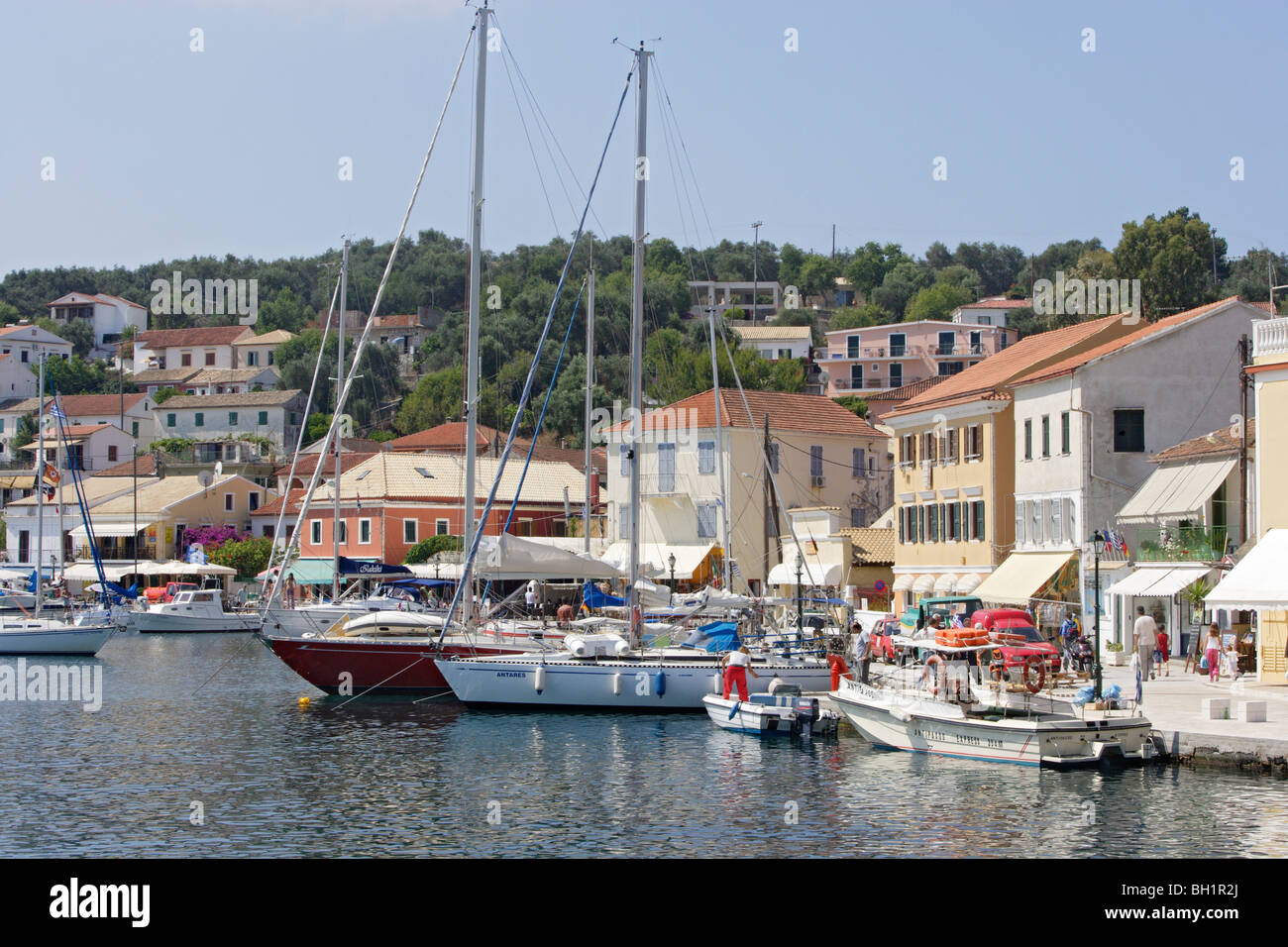 Boats are moored in Gaios harbour, Paxos, Ionian Islands, Greece Stock Photo