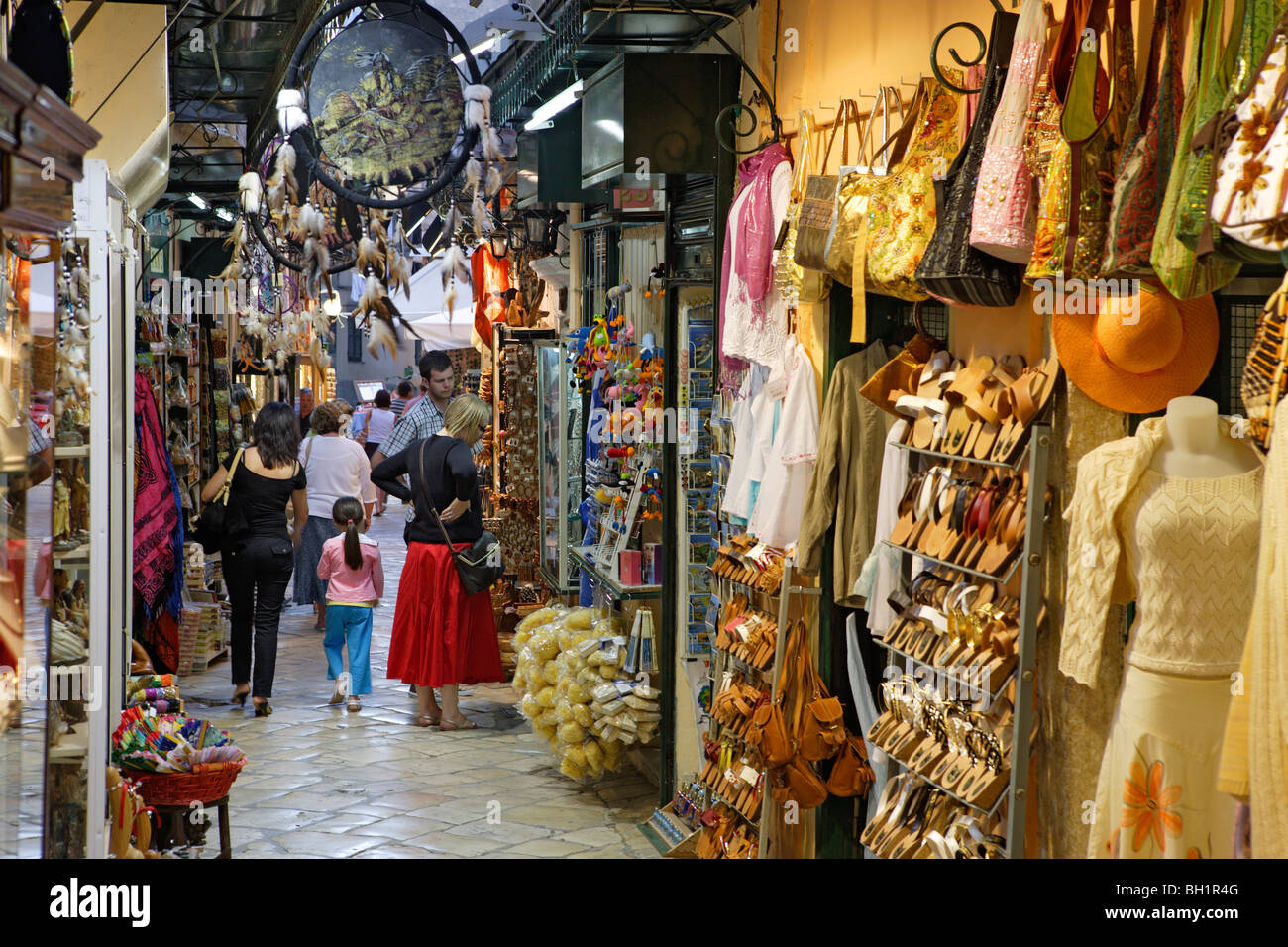 People standing in a shop in the Kambiello district of Corfu, Ionian Islands, Greece Stock Photo