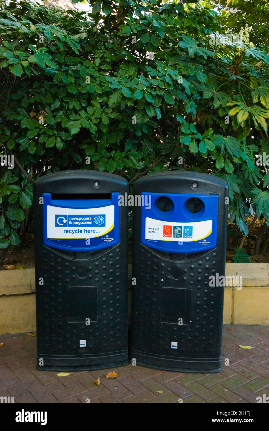 Recycling bins Victoria Embankment Gardens central London England UK