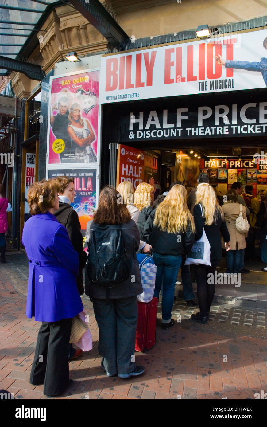 Queue to discount theatre ticket counter Leicester Square central London England UK Stock Photo