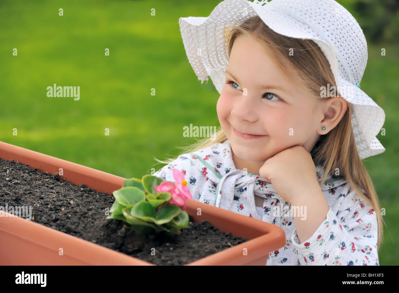 Little Girl Gardening Stock Photo Alamy