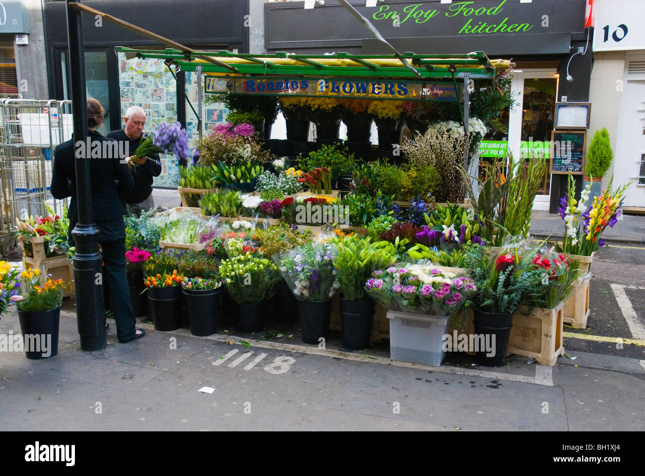 Flower stall Berwick street Soho central London England UK Stock Photo