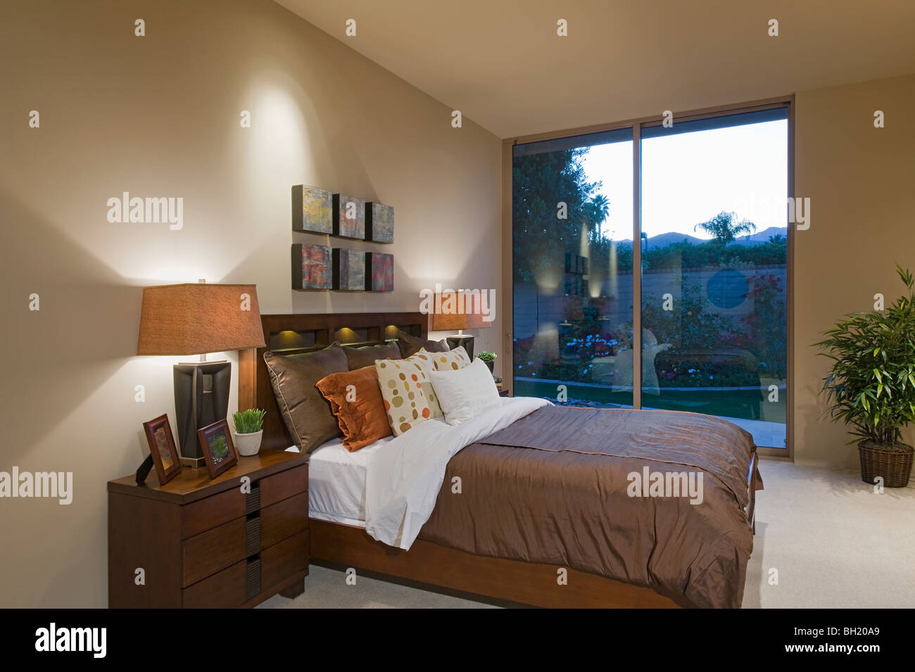 Matching bedside lamps in Palm Springs home interior Stock Photo Alamy