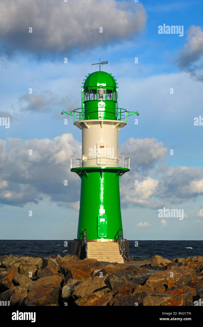 Green-white lighthouse on the mole of Warnemuende, Rostock-Warnemuende, Mecklenburg-Western Pomerania, Germany Stock Photo