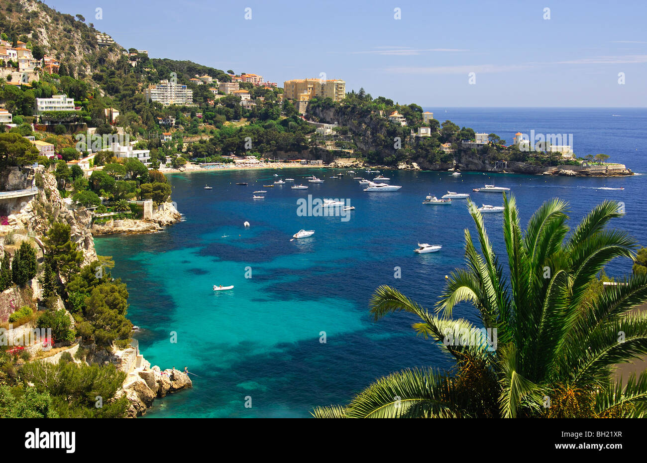Picturesque bay with boats on the Mediterranean Sea near Cap-d’Ail ...