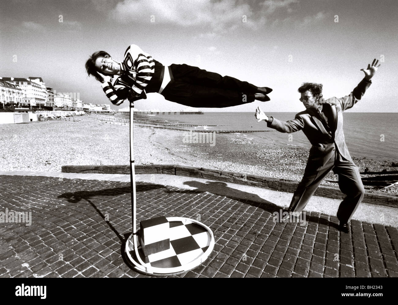 Magician levitating a woman Stock Photo Alamy