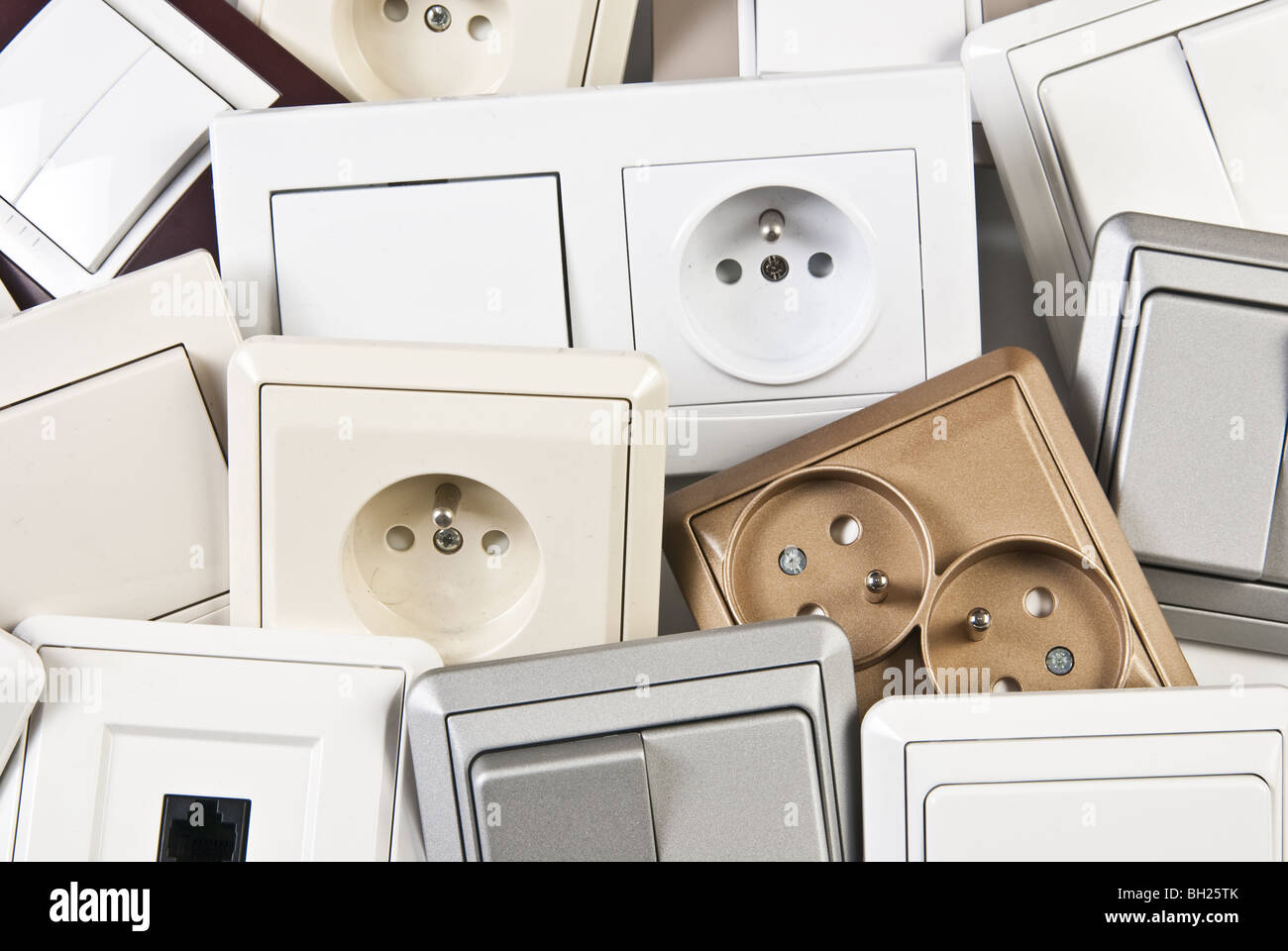 couple of electrical colorful switches and sockets Stock Photo - Alamy