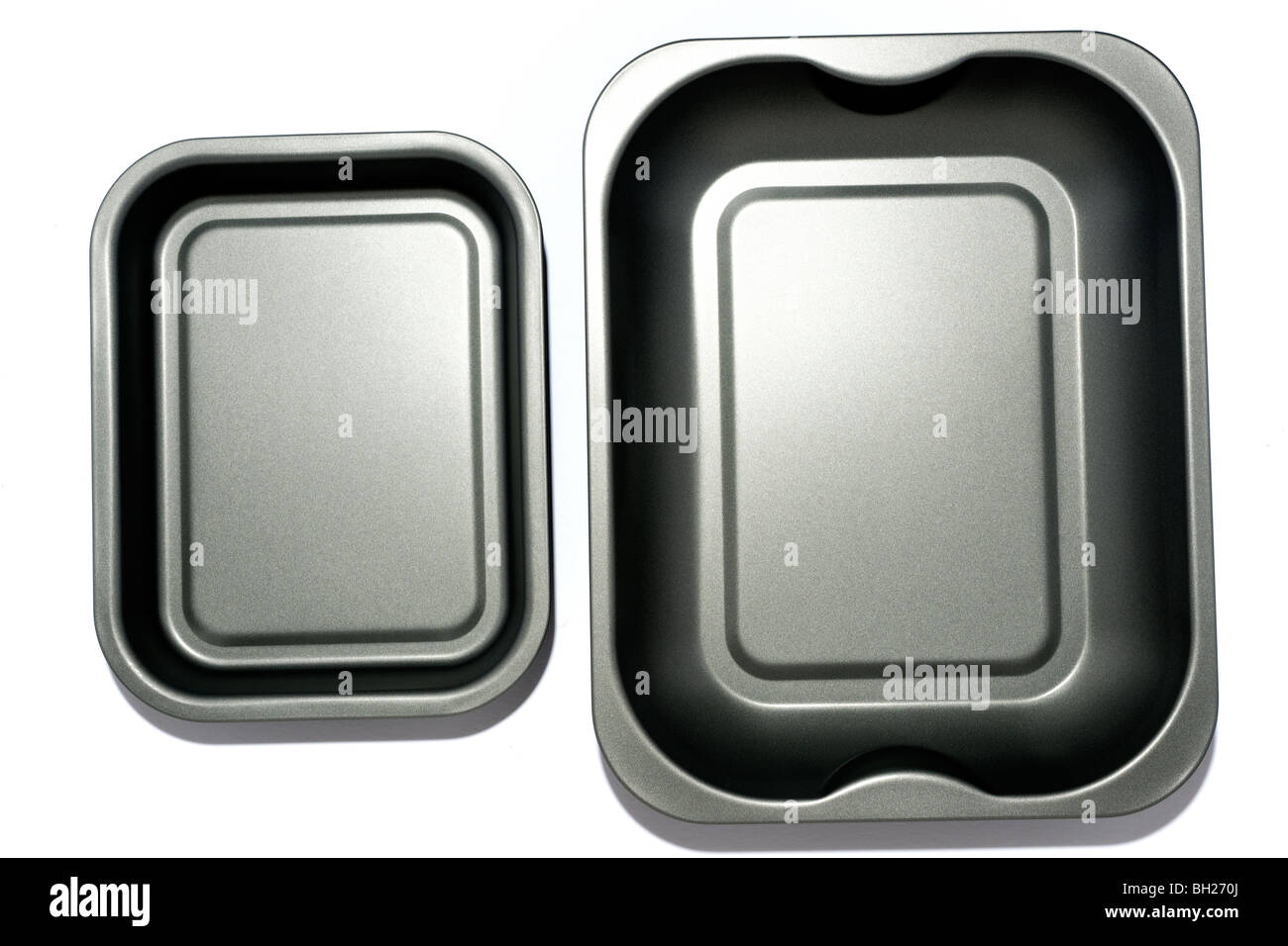 Two grey teflon coated metal baking trays Stock Photo