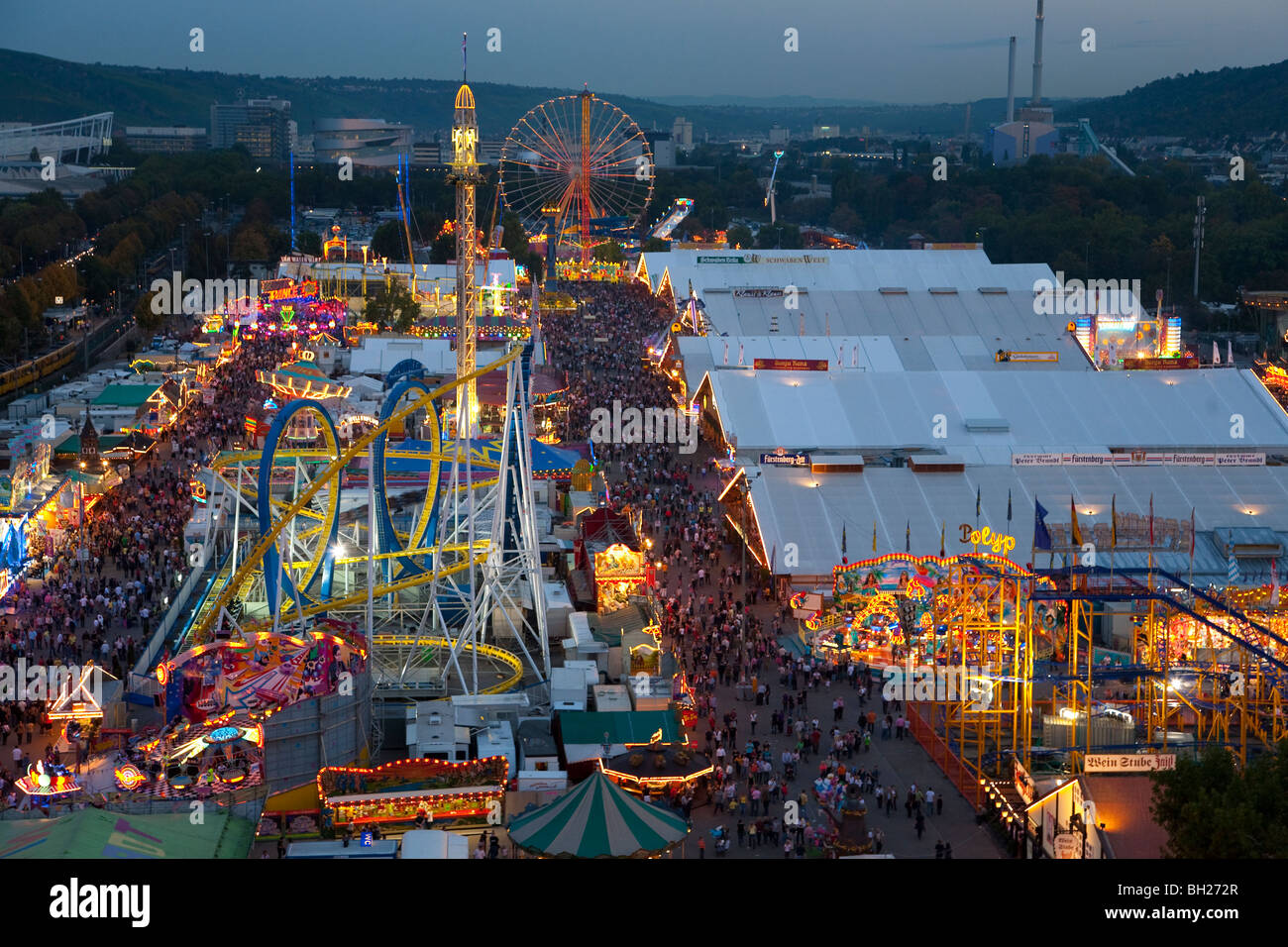 RIDES AND BEER TENTS AT CANNSTATTER VOLKSFEST FOLK FESTIVAL IN STUTTGART, GERMANY Stock Photo