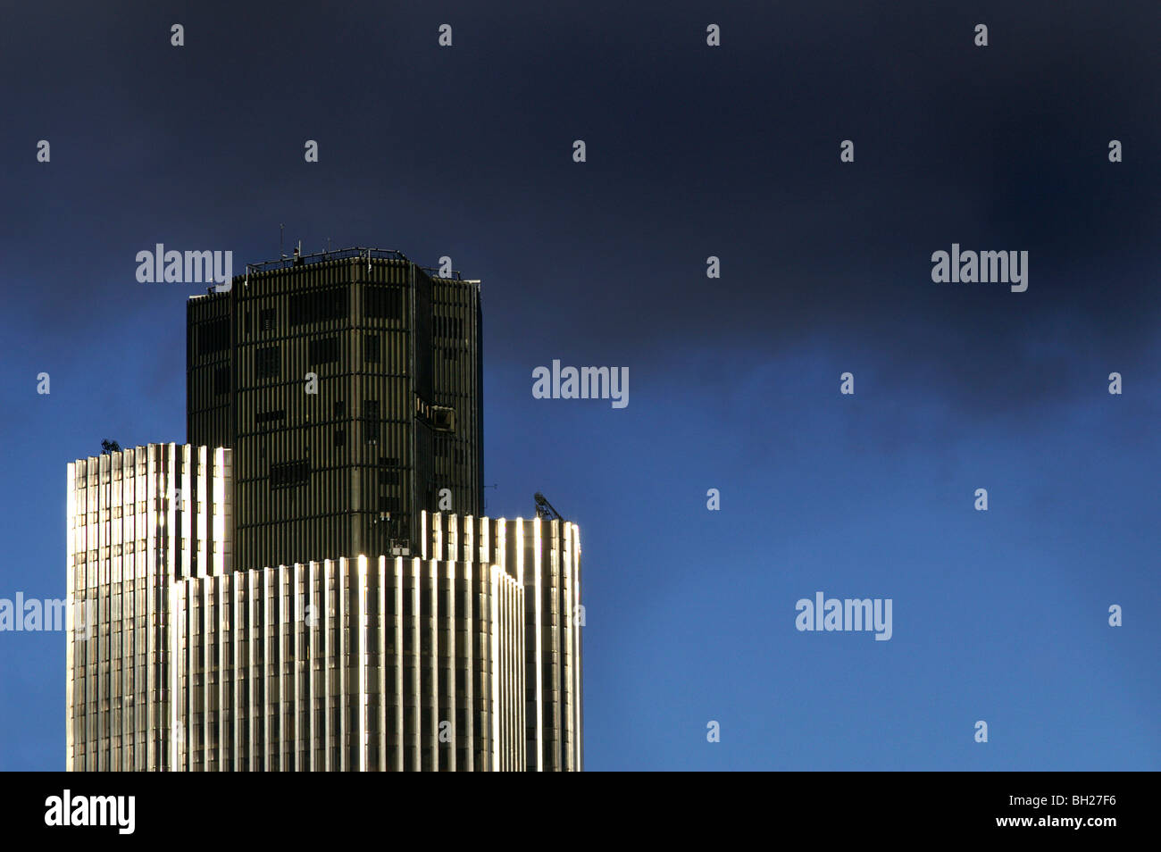 Black clouds over Tower 42, formerly the NatWest Tower, City of London Stock Photo