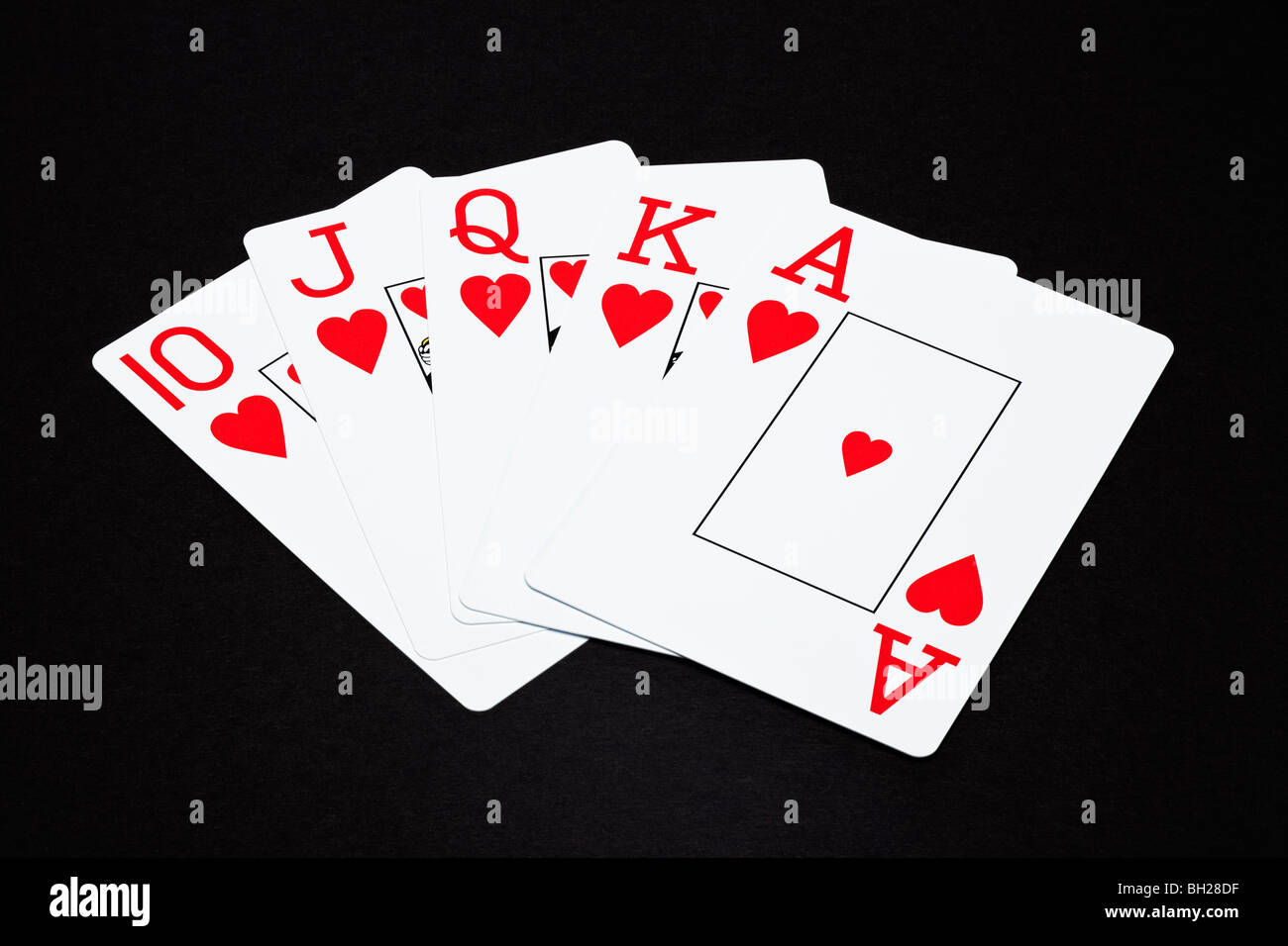 Playing cards showing a Royal Flush poker hand Stock Photo Alamy