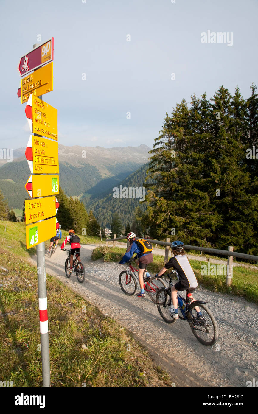 BICYCLISTS, SCHATZALP, DAVOS, GRISONS, SWITZERLAND Stock Photo