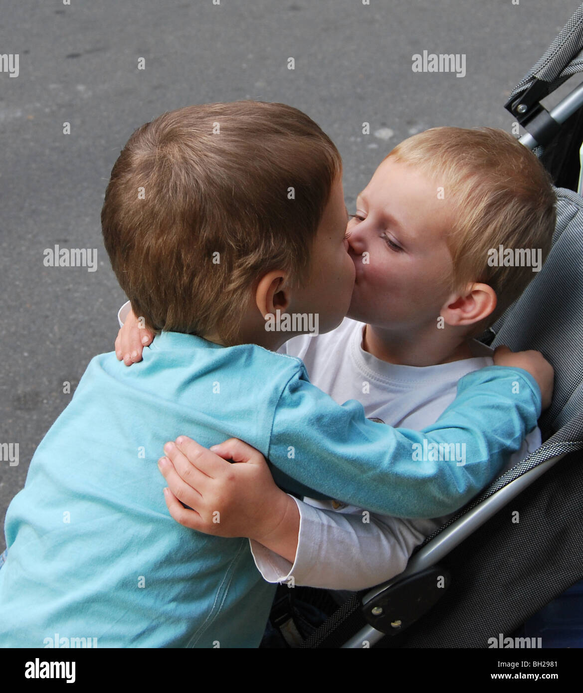 Brotherly love, 2 brothers sharing a kiss Stock Photo - Alamy