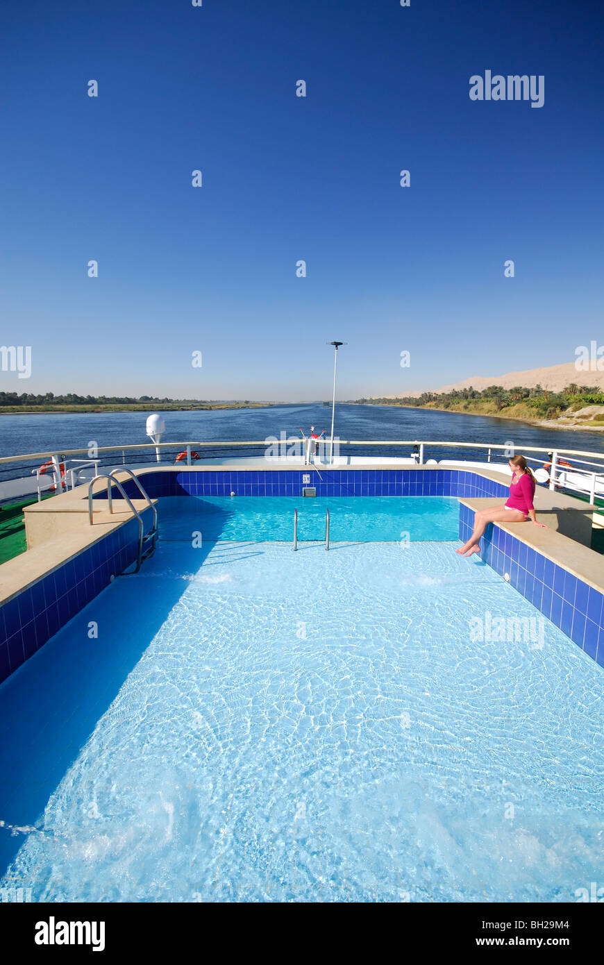 RIVER NILE, UPPER EGYPT. Swimming pool on a Nile cruise boat sailing between Luxor and Aswan