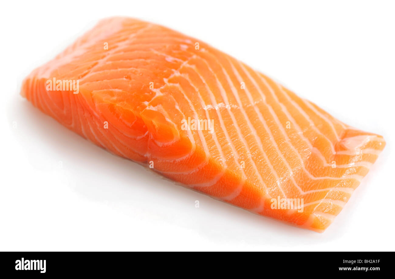 A salmon steak on a white background with a light shadow. Stock Photo