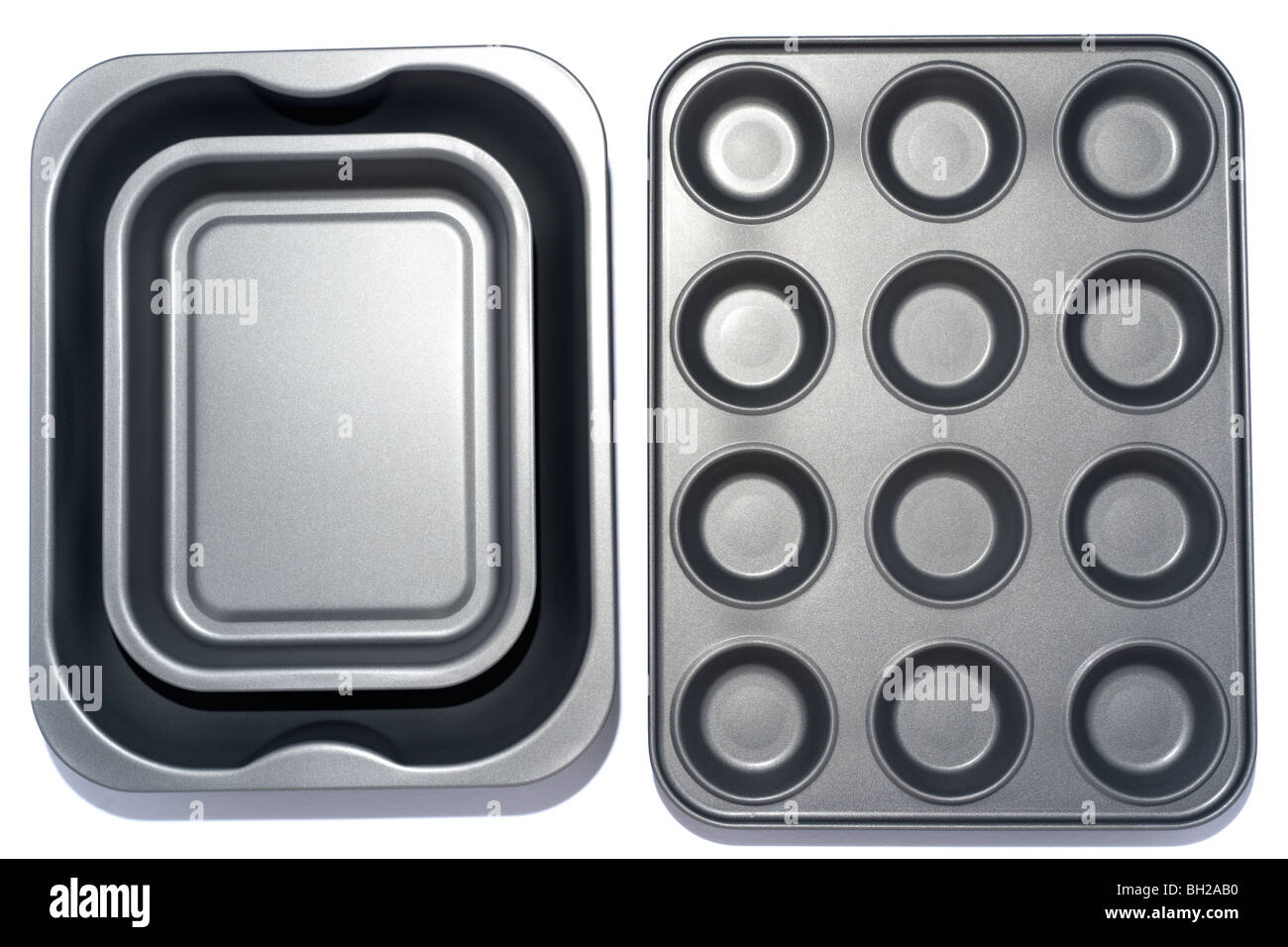 Two grey teflon coated metal baking trays Stock Photo Alamy