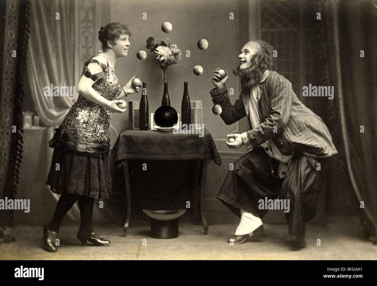 Clown Couple Juggling Nine Balls Stock Photo Alamy