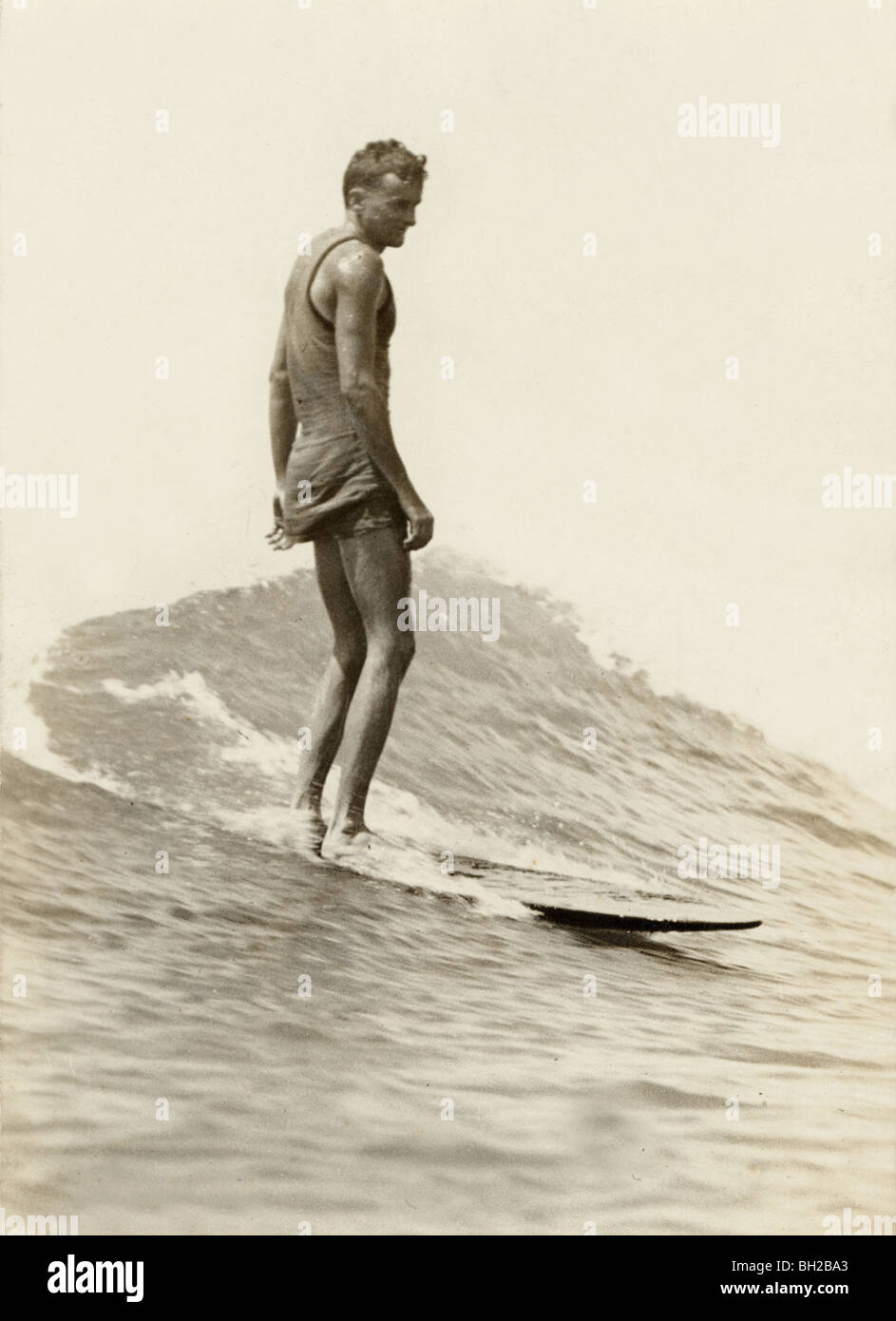 Ancient Surfer Dude Surfing Stock Photo