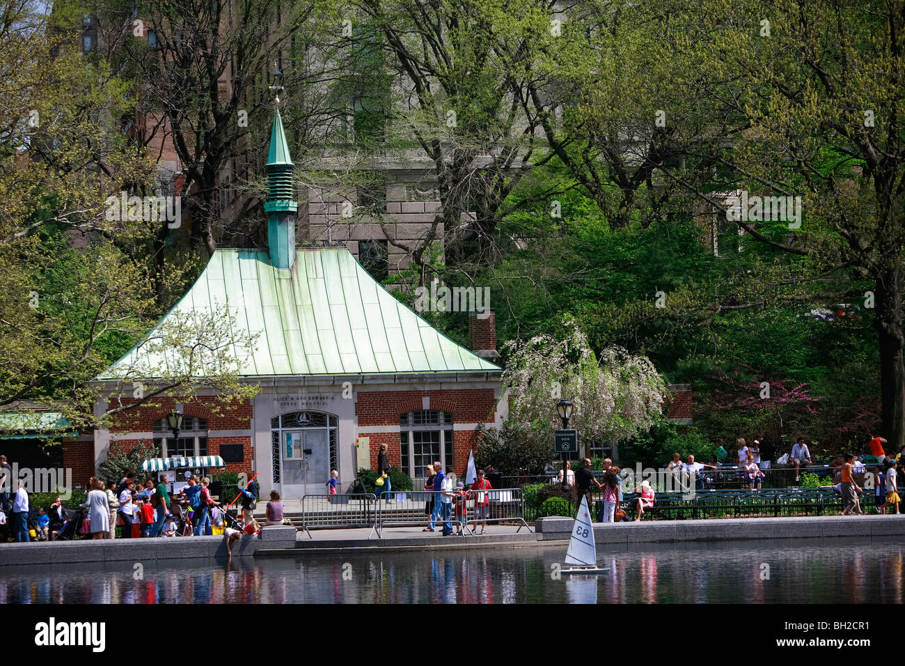 Central Park during spring season when cherry tree blossoms and tourists visit New York city Stock Photo