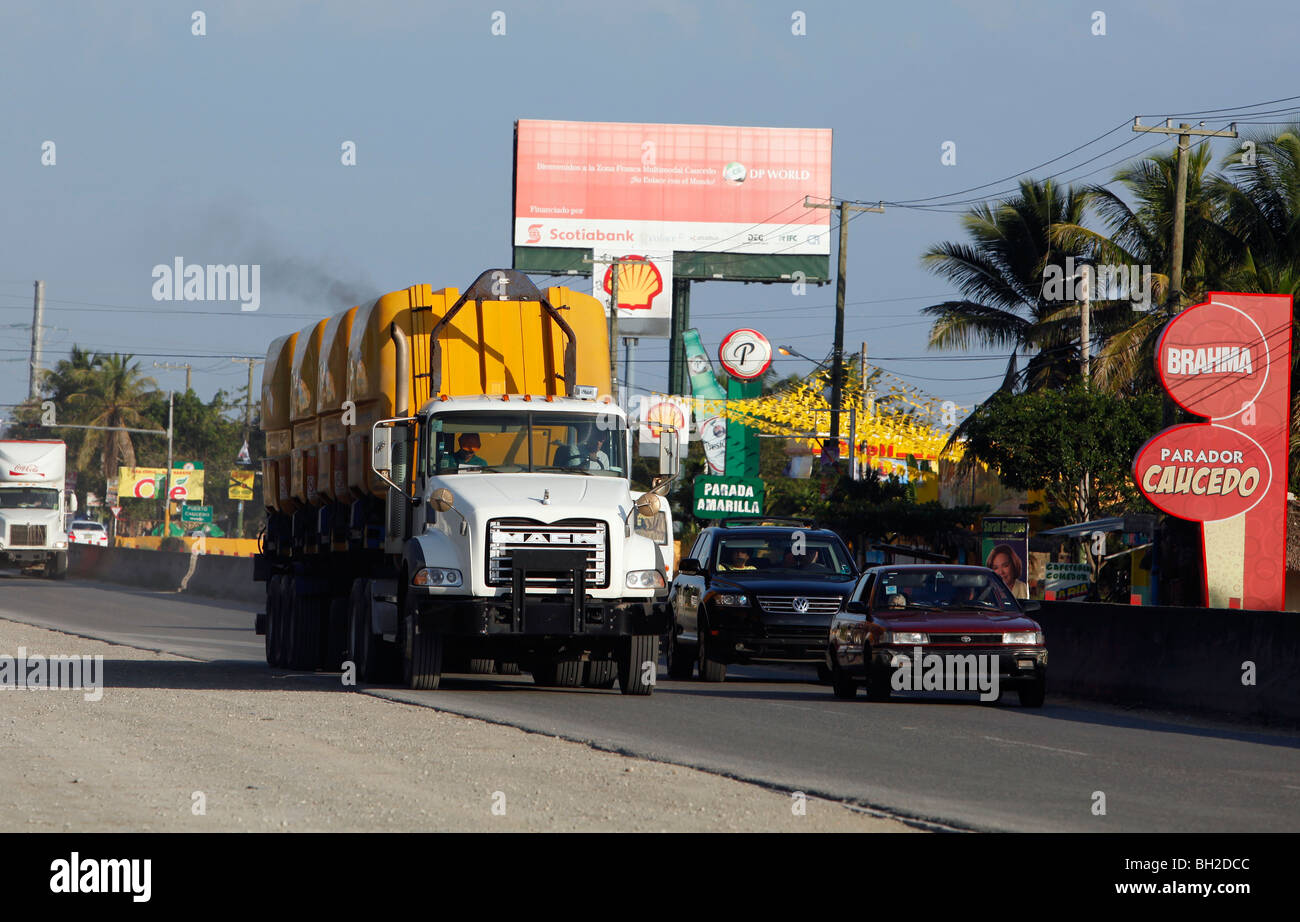 Traffic on a divided highway west of Santo Domingo in Boca Chica, Dominican Republic Stock Photo