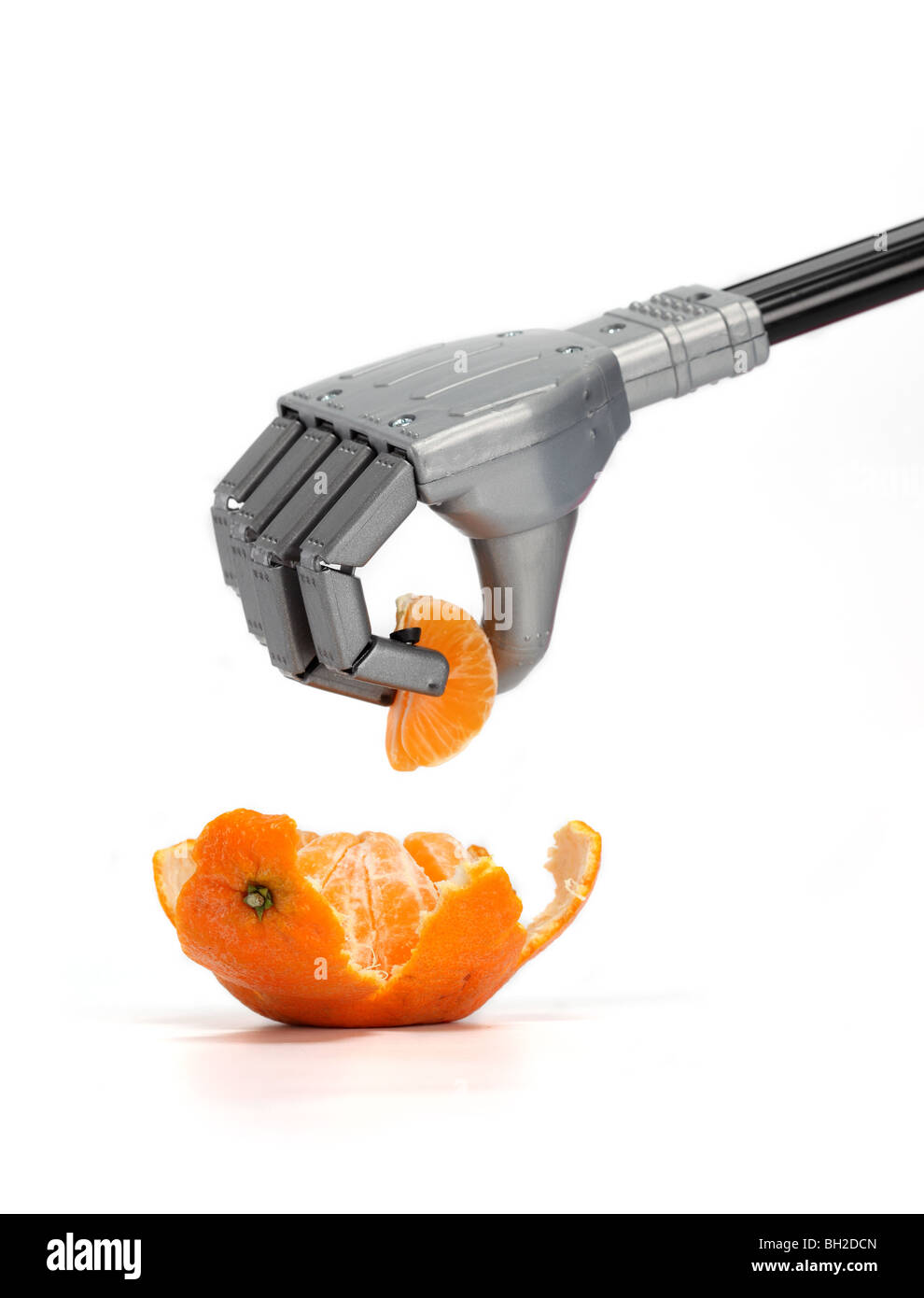 Mandarin robot grab food hand Cut Out Stock Images & Pictures - Alamy