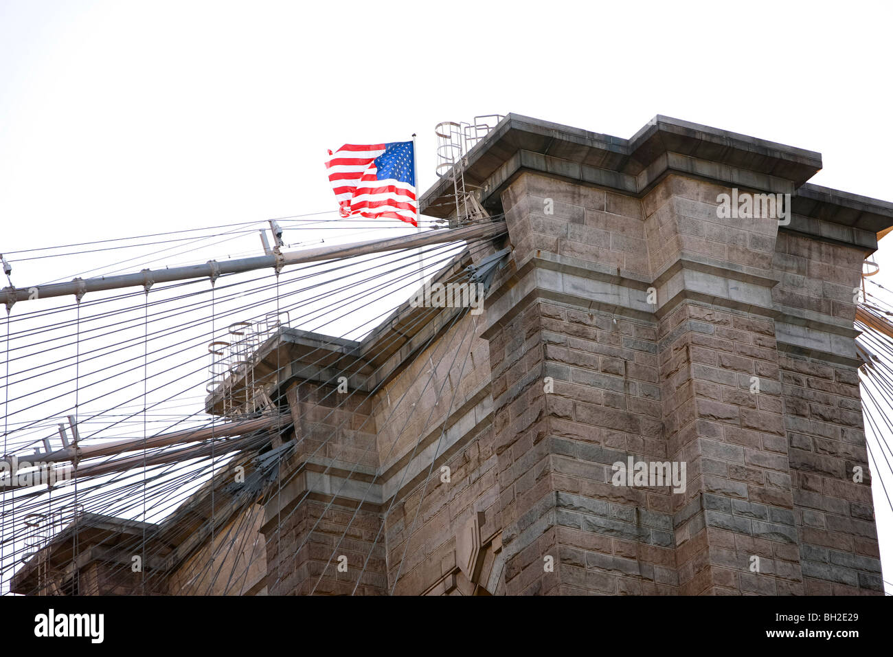 View of the Brooklyn Bridge Night and Days where people walk or ride across the East river to Manhattan Stock Photo