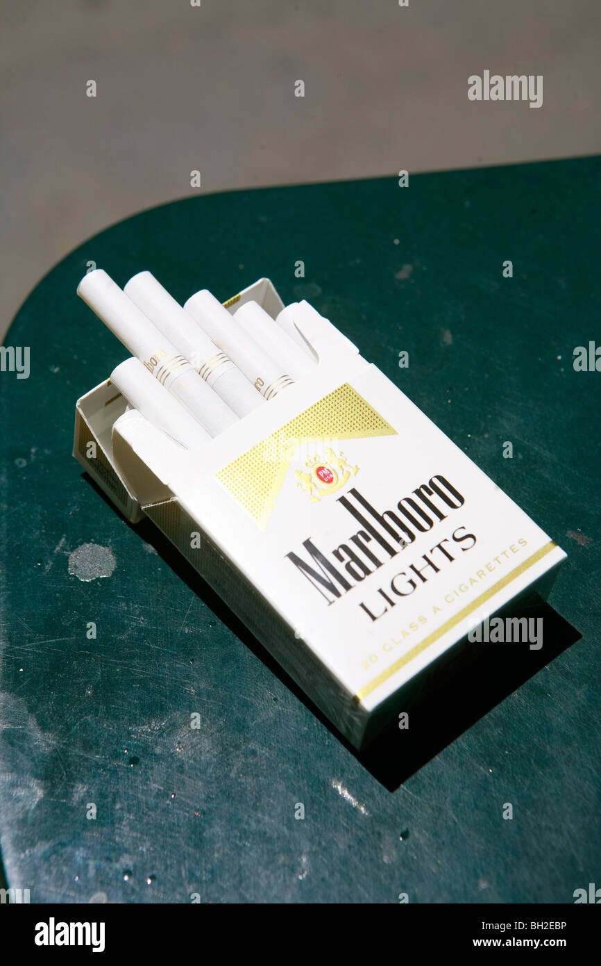 Marlboro cigarette and book of matches Stock Photo