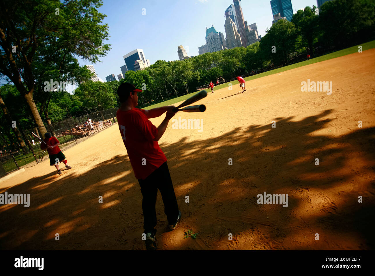 Central Park during spring season when cherry tree blossoms and tourists visit New York city Stock Photo