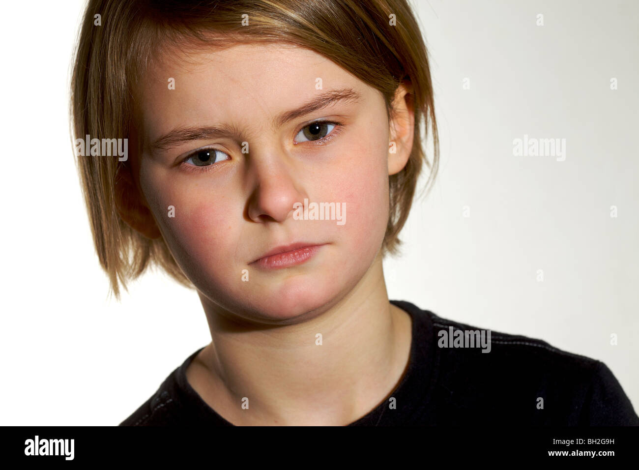Young girl smiling angry sad expression facepull emotion bored grunge Stock Photo