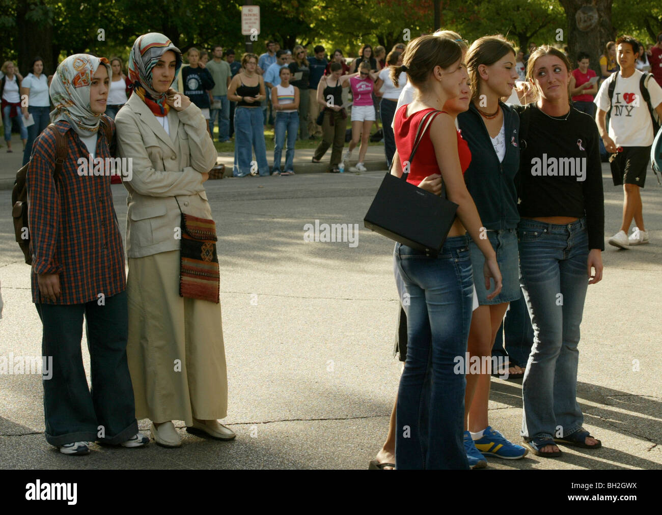 College students attend a one year anniversary rememberance ceremony for victims of the Sept. 11 2001 terrorists attacks. Stock Photo